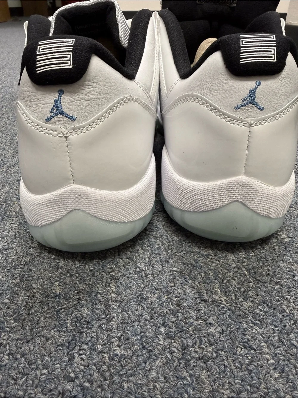 Jordan Men's White and Black Athletic Shoes with Ice Blue Accents - Picture 6 of 10